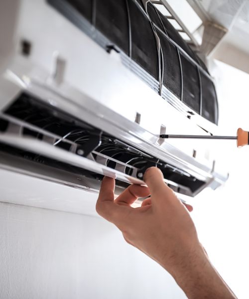 Technician installing Airconditioner